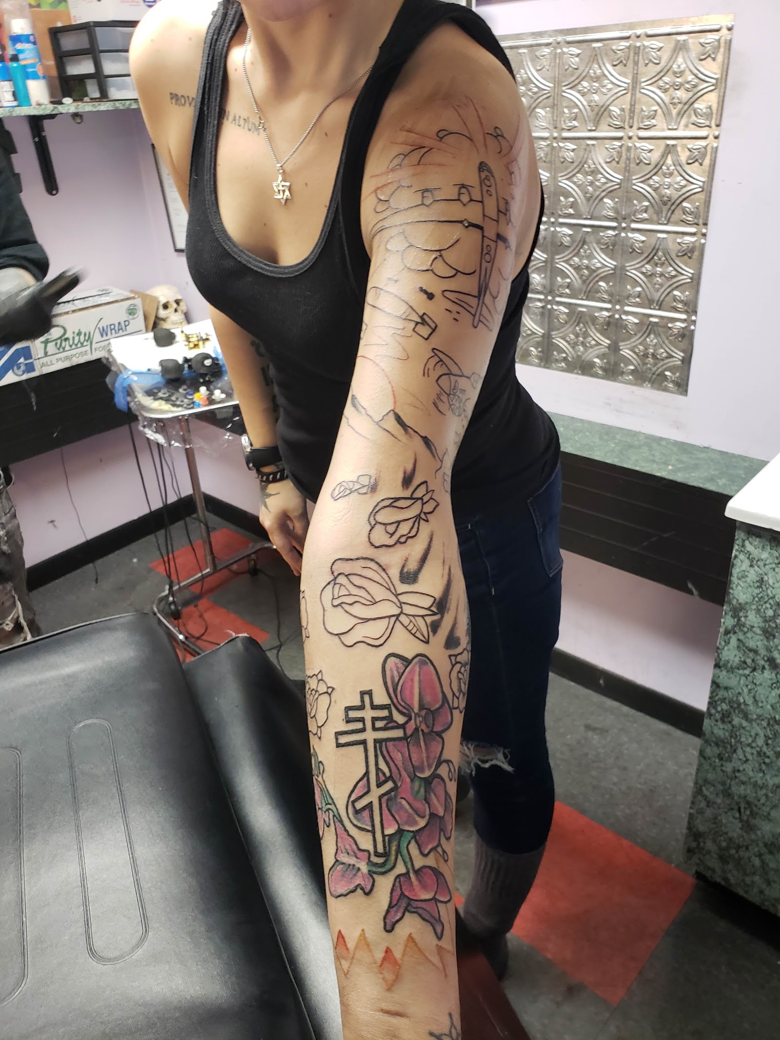 Express Yourself Tattoos & Body Piercing tattoo work — photo 3