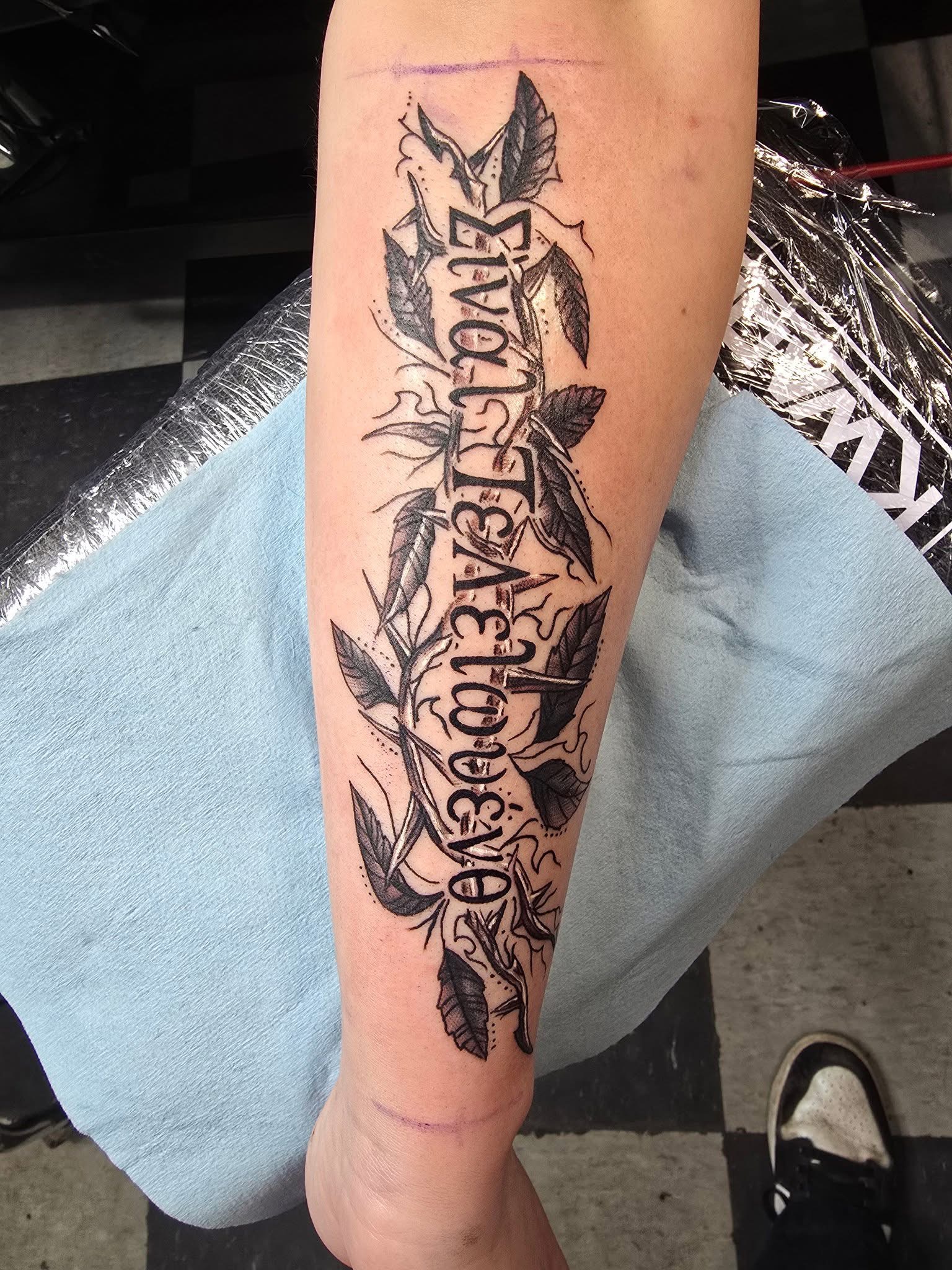 Iron Lily Tattoo & Piercing Studio tattoo work — photo 3