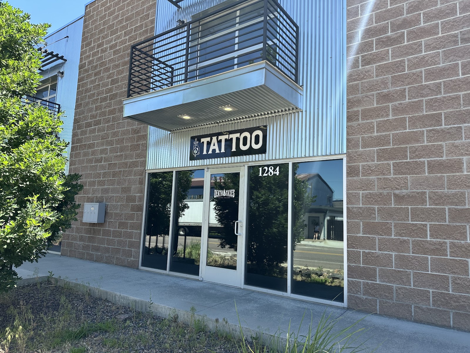 Death and Taxes Tattoo tattoo parlor in Denver, CO