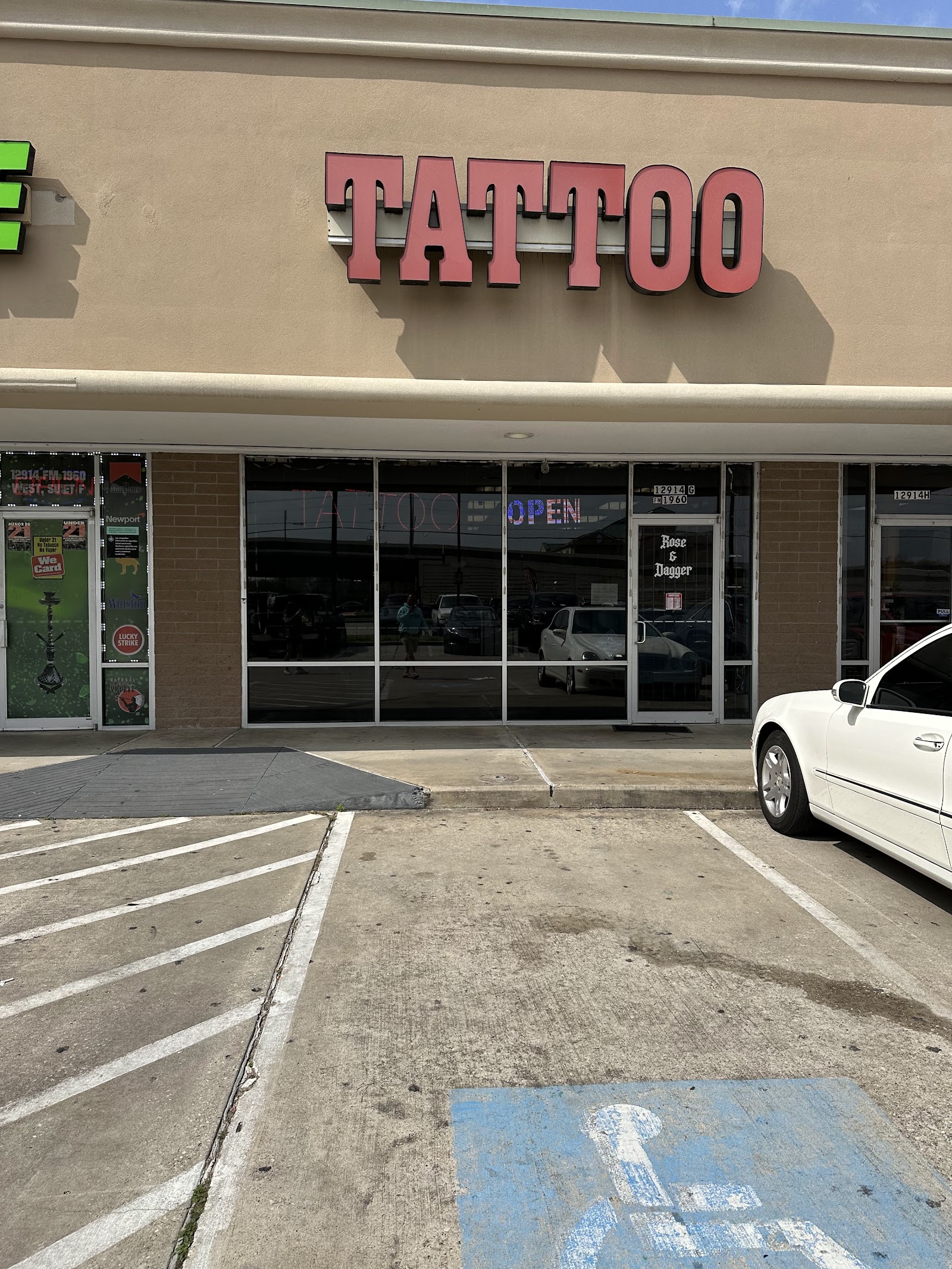 Rose & Dagger Tattoo tattoo work — photo 3