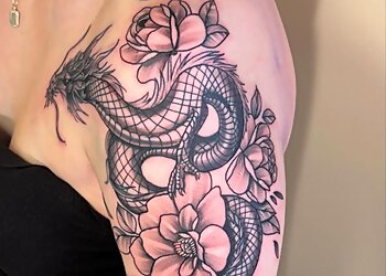 Tattoo Warehouse AND Body Piercings — tattoo studio near Joliet