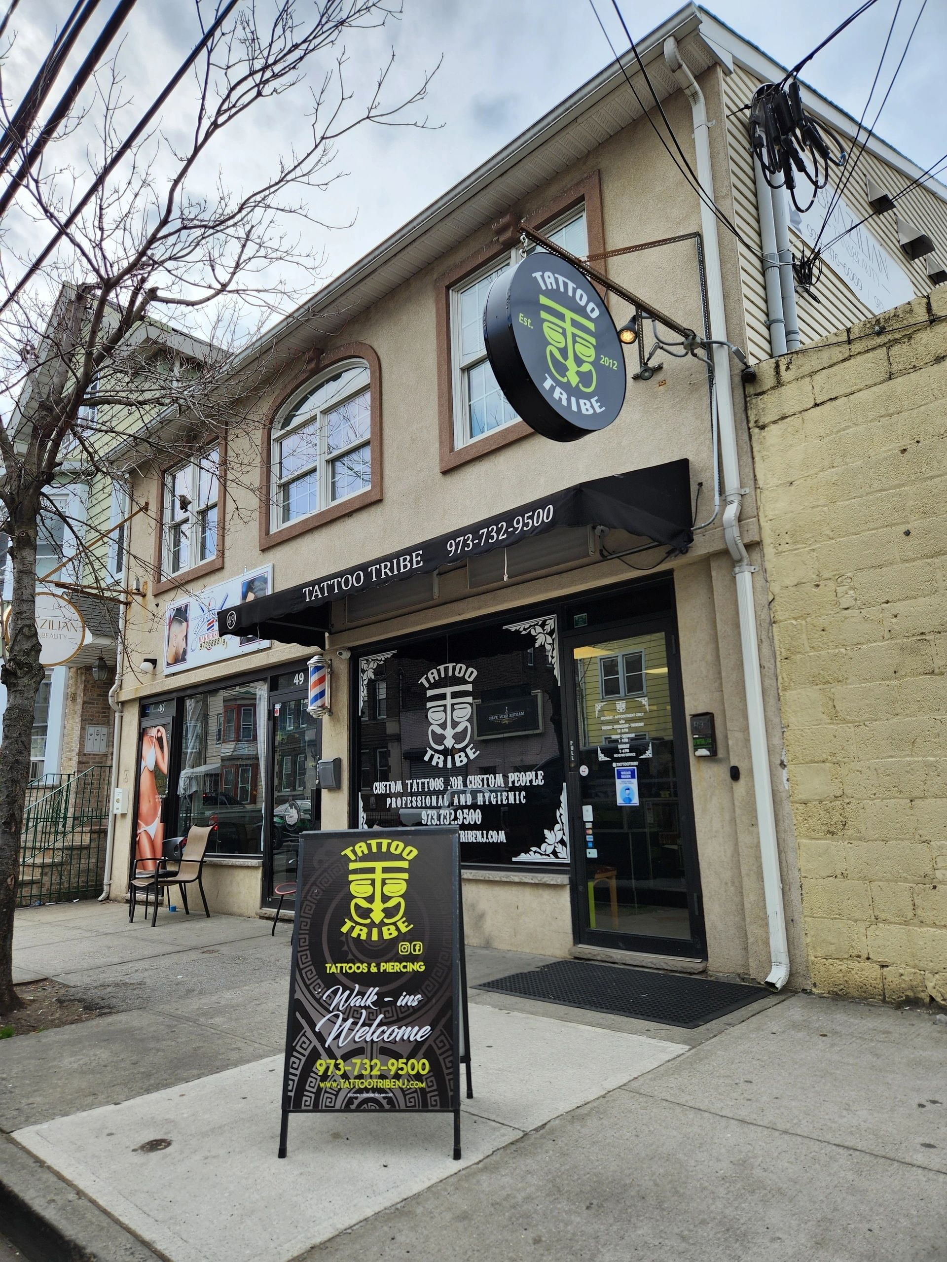 Tattoo Tribe. (English,Spanish & Portuguese) — tattoo studio near Newark