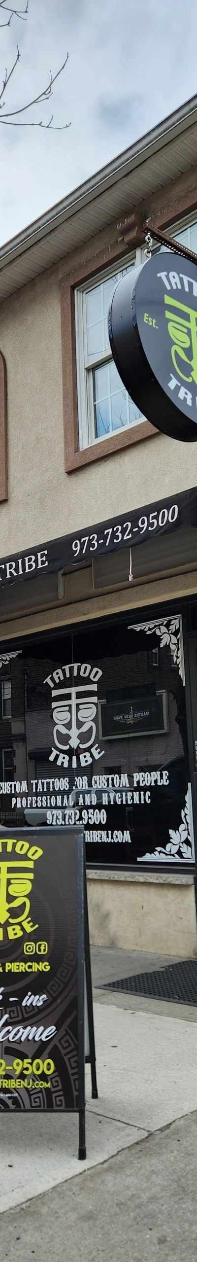 Tattoo Tribe. (English,Spanish & Portuguese) in Newark, NY