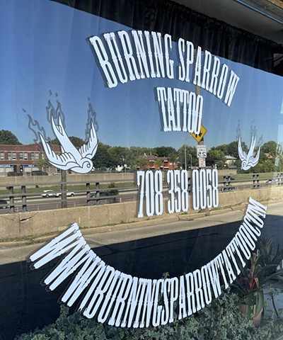 Burning Sparrow Tattoo in Oak Park, IL