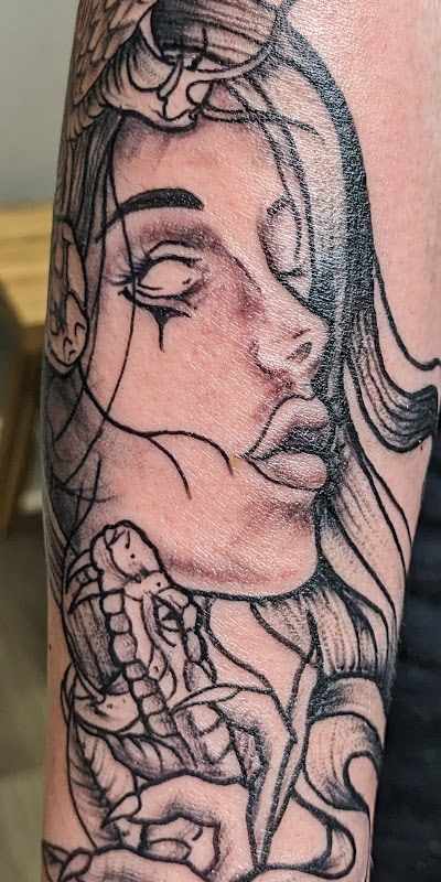 Rise Up Piercing and Tattoo in Racine, WI